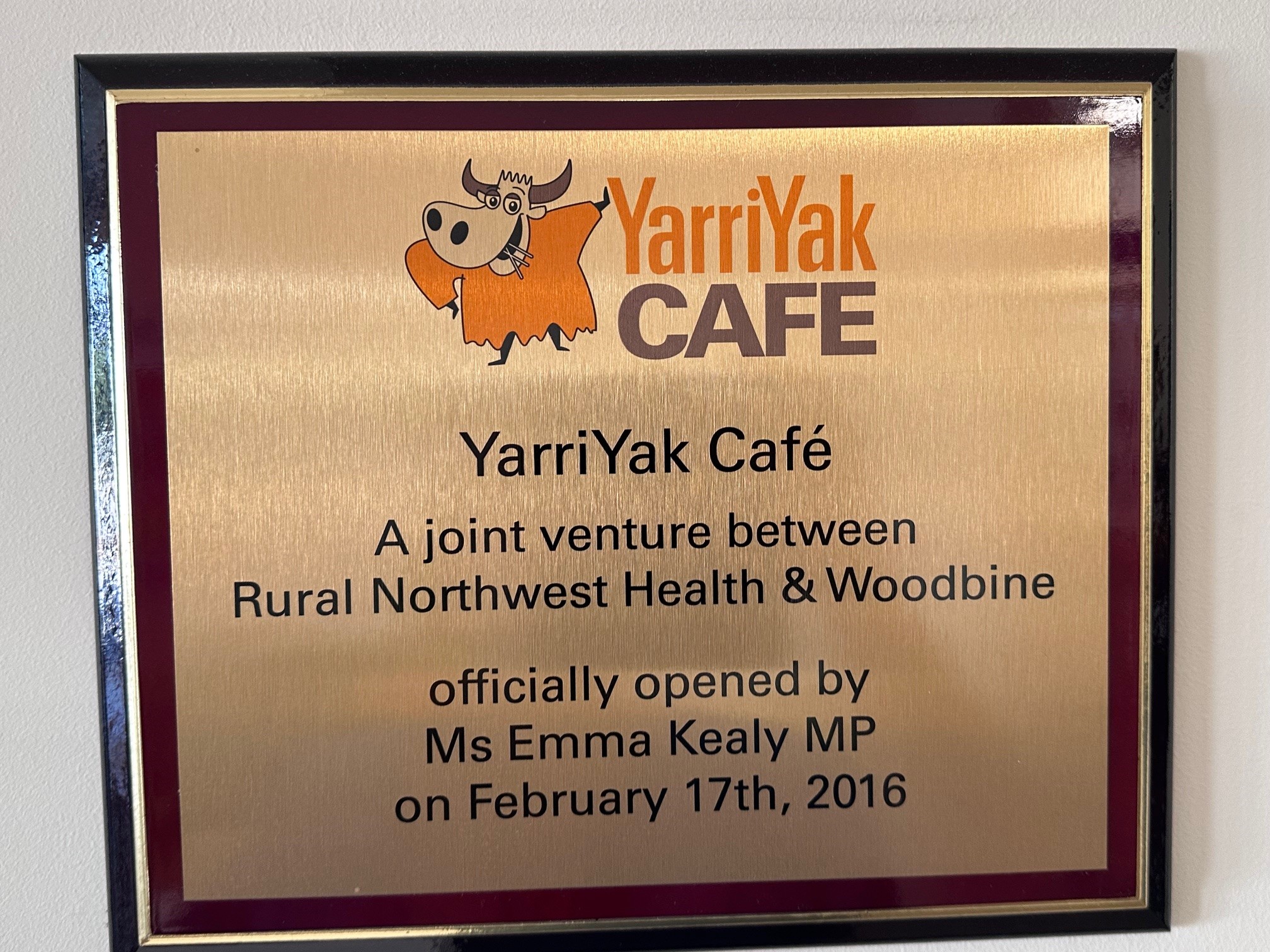 YY Cafe th birthday opening plaque